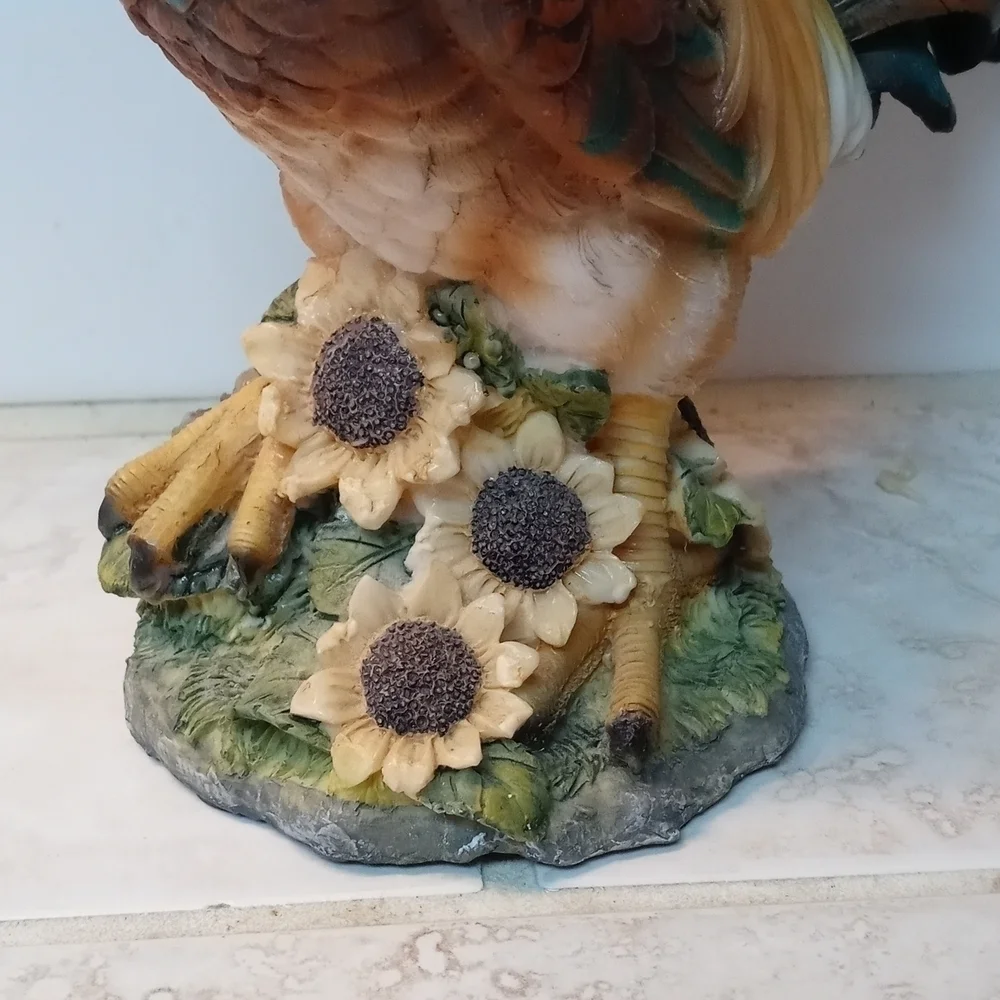 Farm decor rooster with sunflowers and a beautiful blue tail